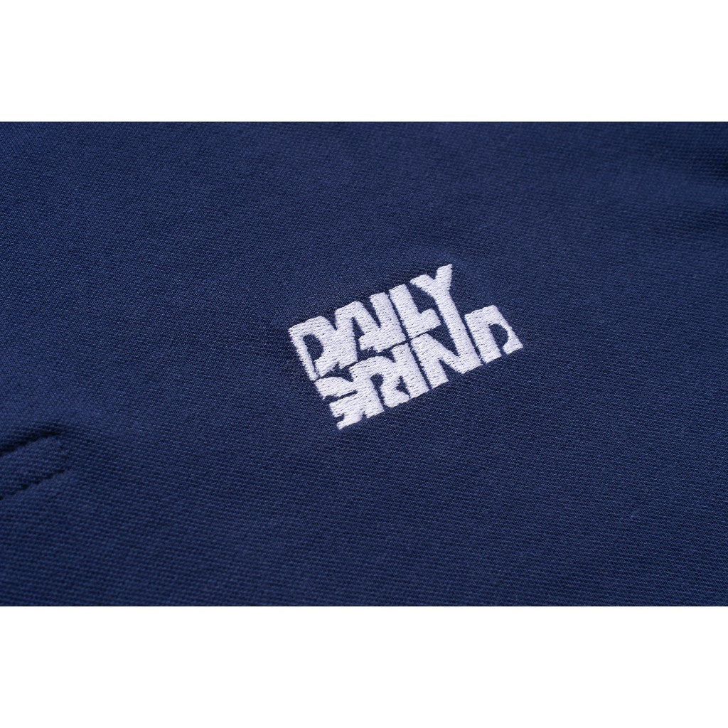 DAILY GRIND SHEAR POLO SHIRT NAVY BLUE