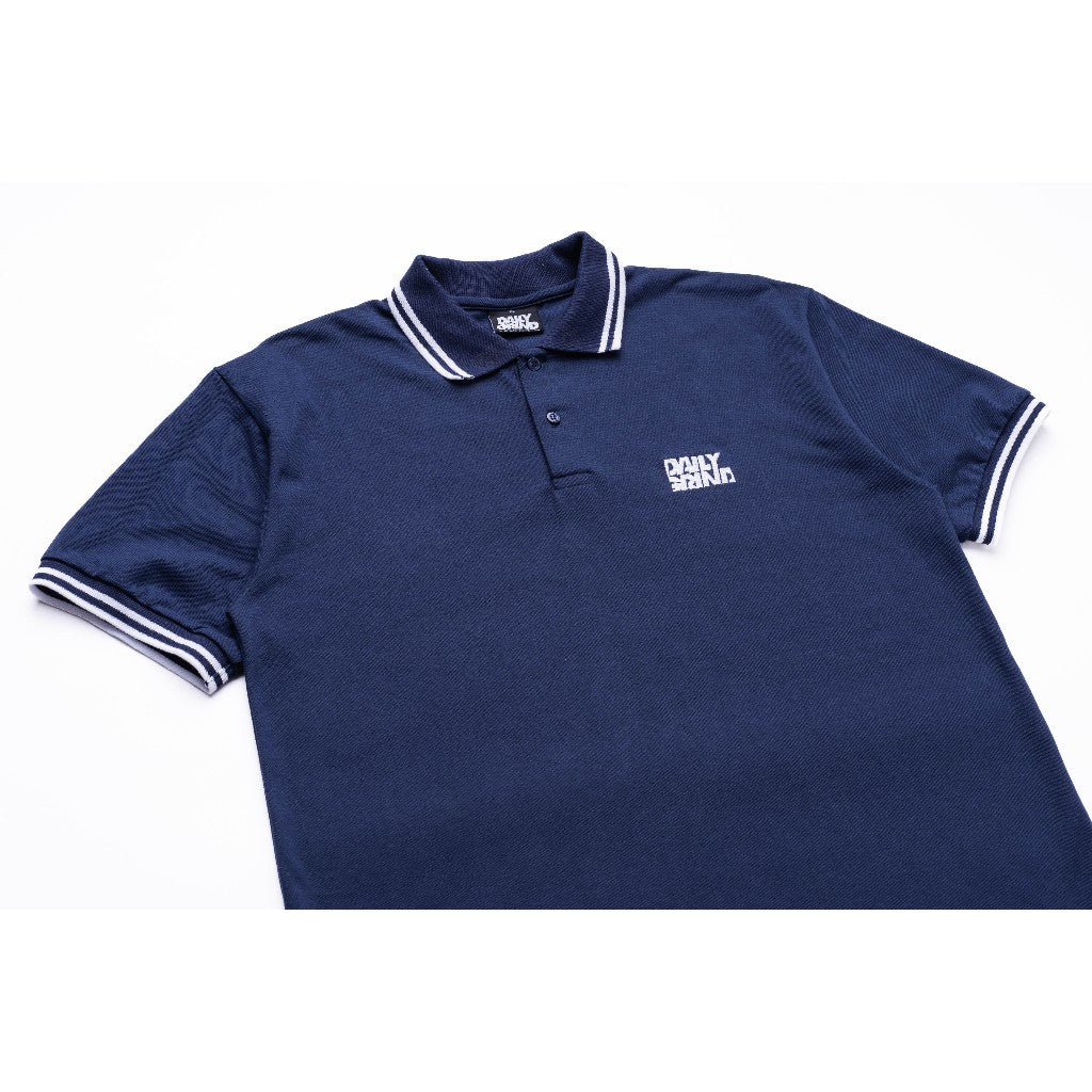 DAILY GRIND SHEAR POLO SHIRT NAVY BLUE