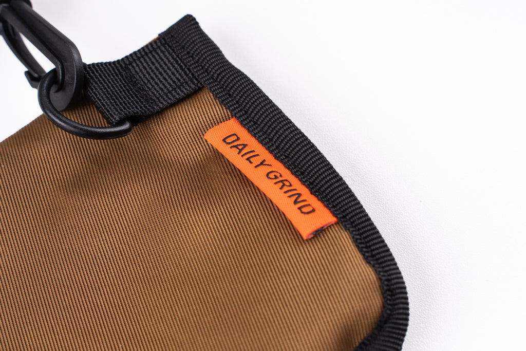 DAILY GRIND CITY PULSE SLING KHAKI