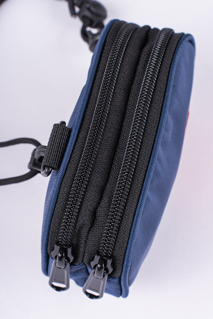 DAILY GRIND CARRIER SLING POUCH NAVY BLUE