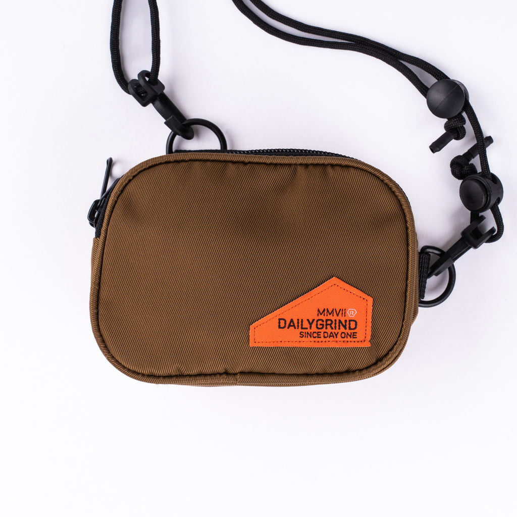 DAILY GRIND CARRIER SLING POUCH KHAKI